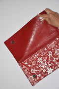 Clutch fantasia rosso e bianco