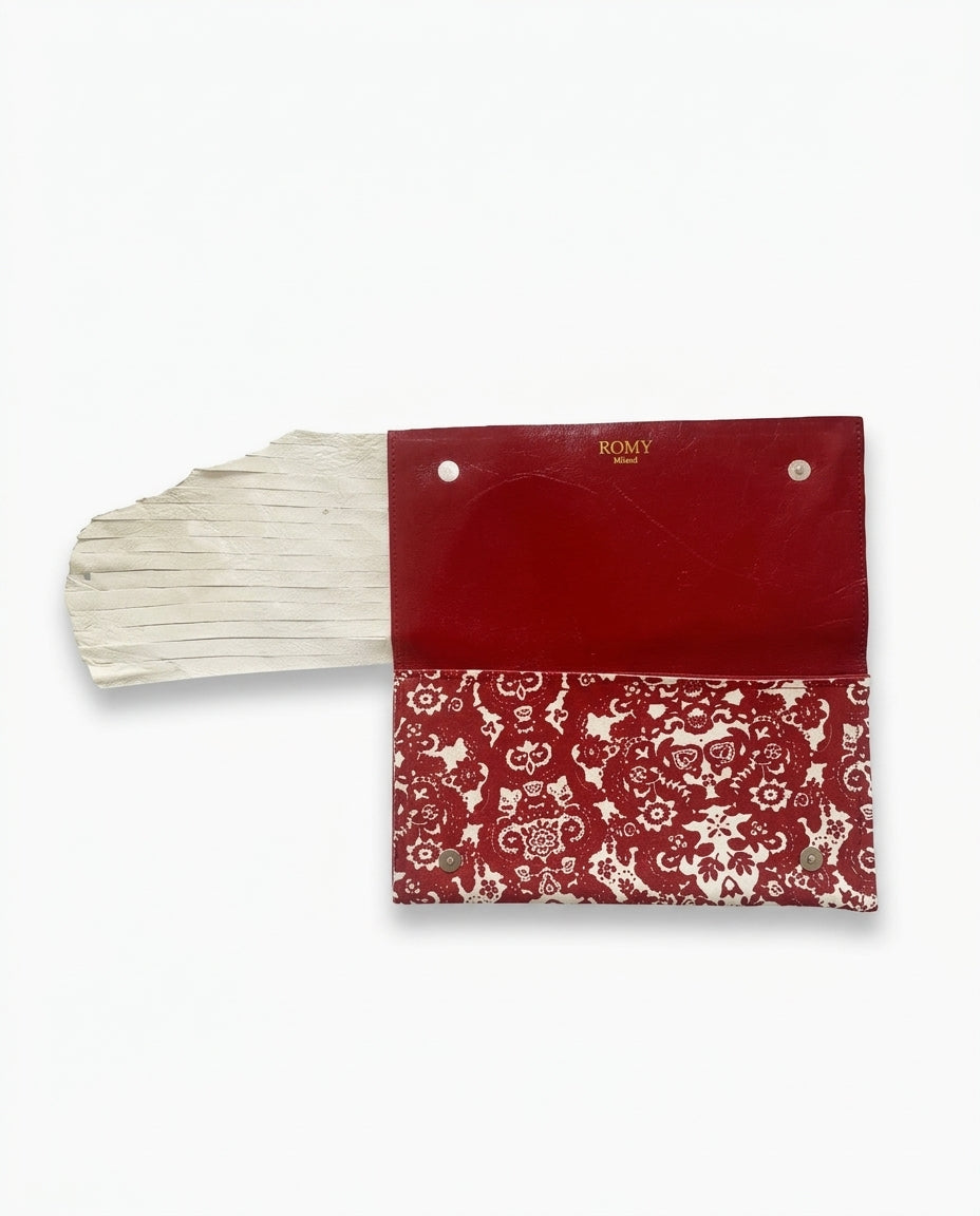 Clutch con frangie fantasia rosso e bianco