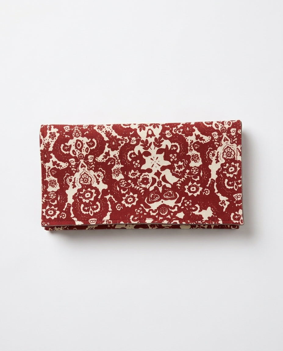 Clutch fantasia rosso e bianco