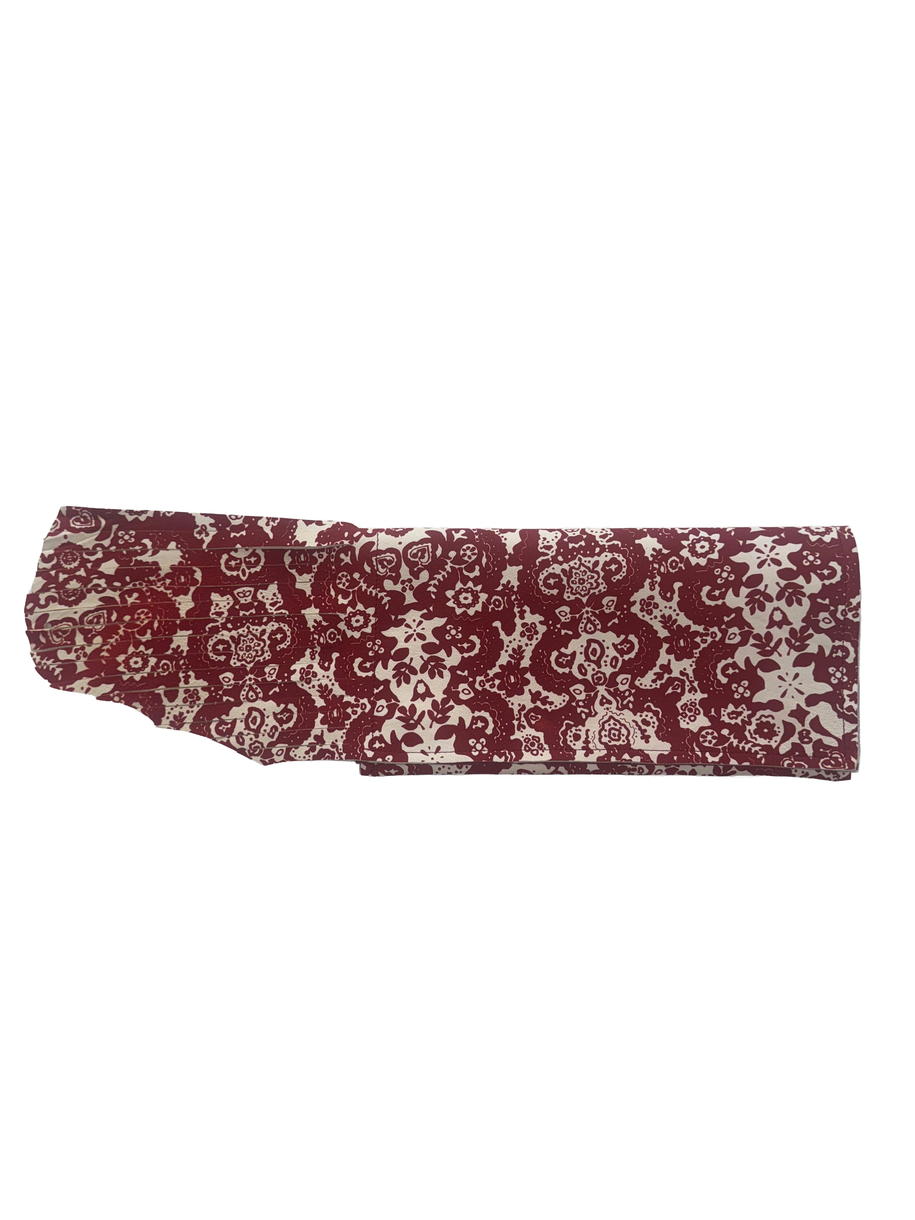 Clutch con frangie fantasia rosso e bianco
