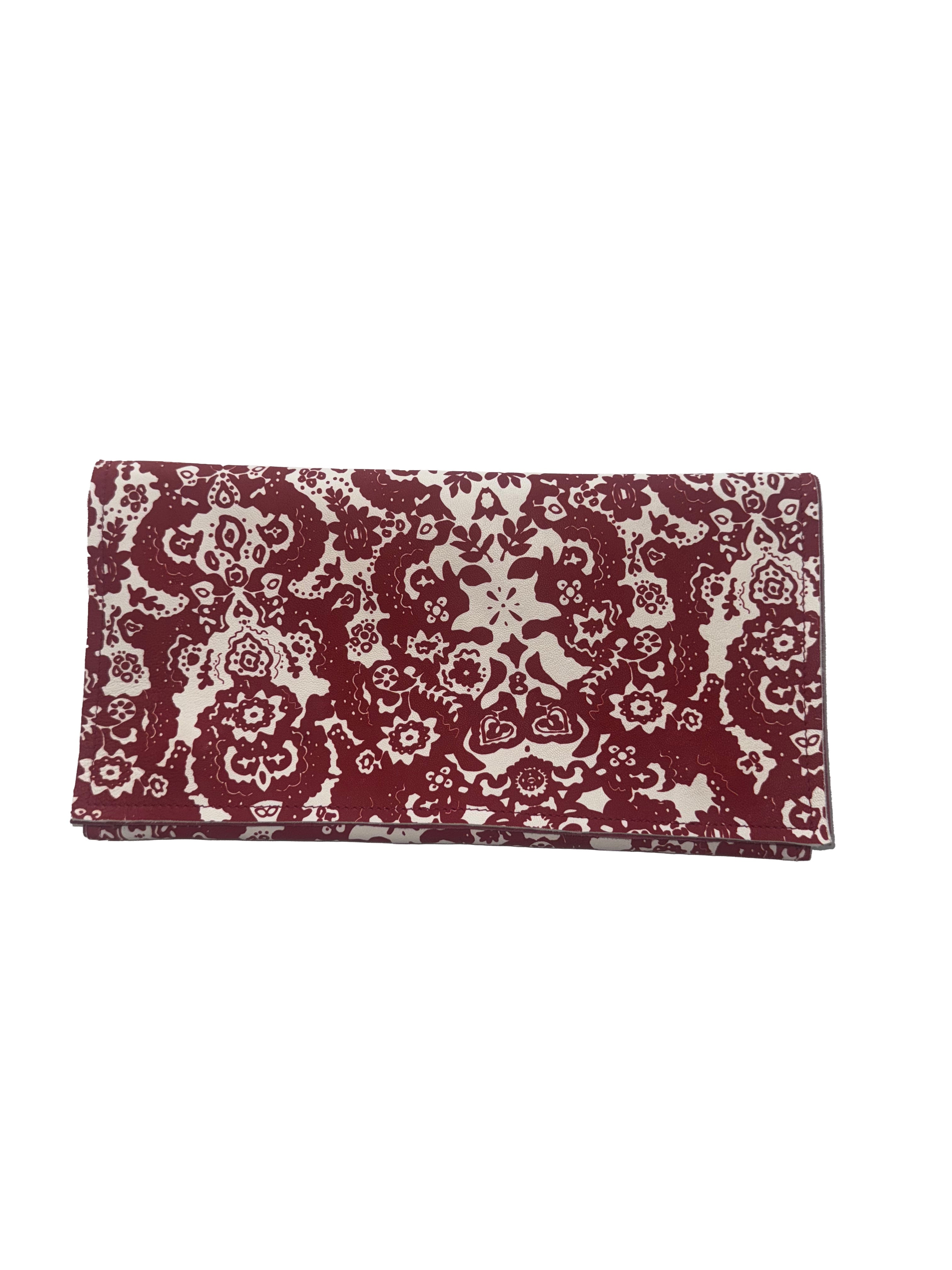 Clutch fantasia rosso e bianco